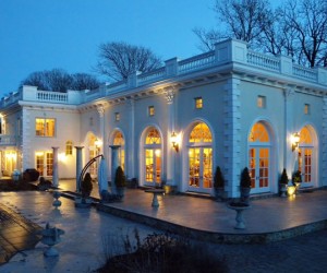 “Crawford Court” Fashioned after the Stanford White Rosecliff Mansion, this drama...