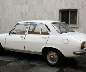 Iranian President Mahmoud Ahmadinejad�s 1977 Peugeot 504 has received a one million d...