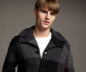 This Burberry Brit jacket sports an updated check pattern in two colors, and incorpor...