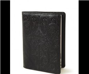 The interior features a week-in-view on two pages with quick view monthly calendars,
