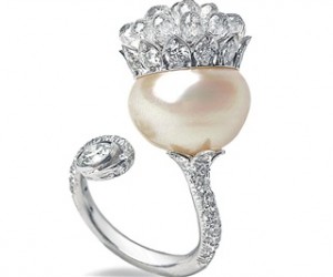 This engagement ring set with a 20-carat, D-color, modified emerald-cut diamond is va...