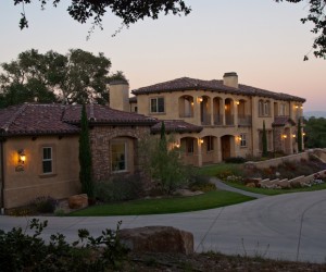 This nearly 6,000 sq. ft. homes sits on almost 5 acres and is impressive from the mom...