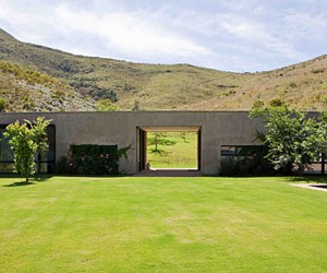 Contemporary architecture and the beauty of the South African countryside are seamles...