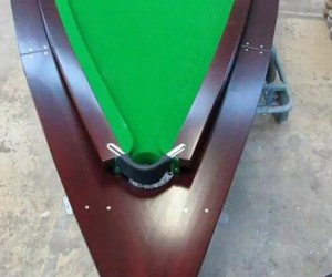 Peter McKee has created a $60, 000 pool table out of a speedboat.