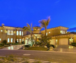 Magnificent custom estate in the exclusive community of Southern Highlands Golf Club.
